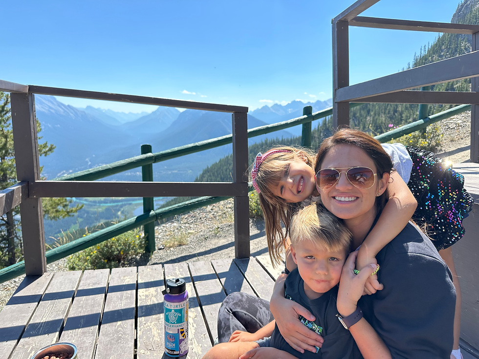 Wide angle view of a family hiking on a scenic trail