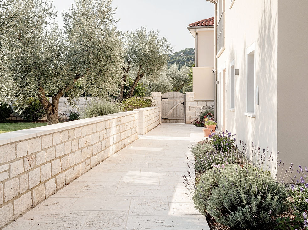 A calm terrace corner at Villa Lume with linen seating and soft evening light.