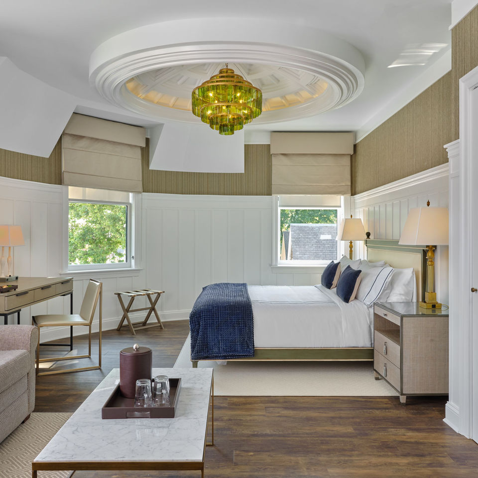 An interior photo of a bedroom at the NorthPort Hotel.