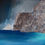 Thumbnail: Contemporary landscape art. A moody seascape with atmospheric looming cliffs, in ink and pastel.