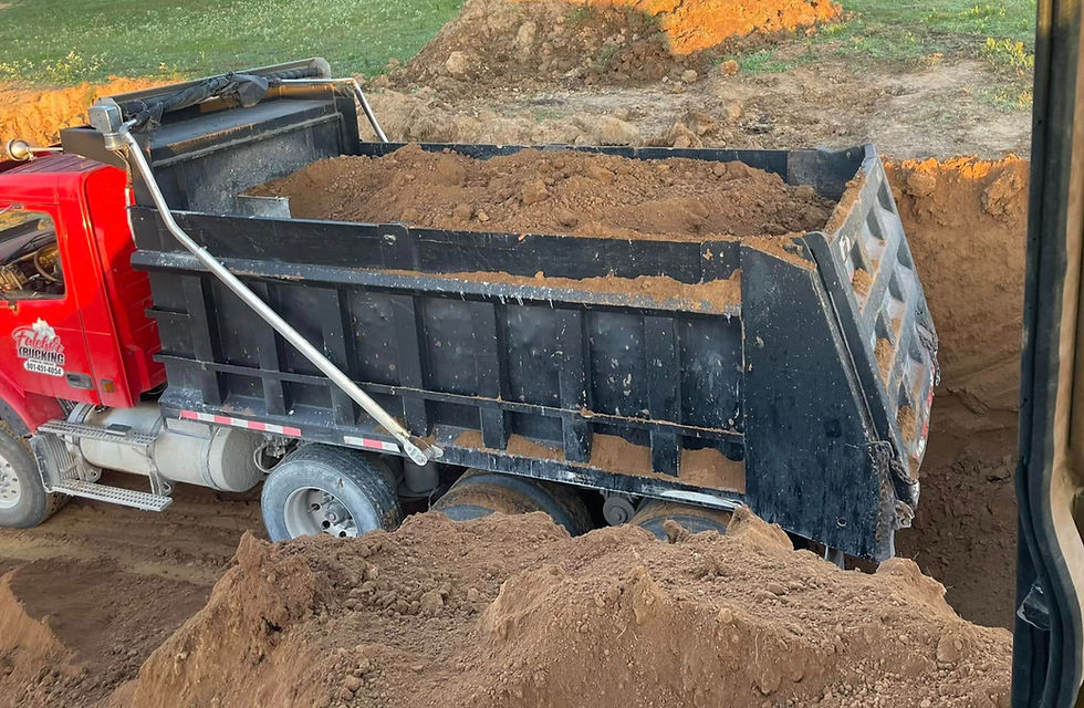 red mack loading with dirt.jpg