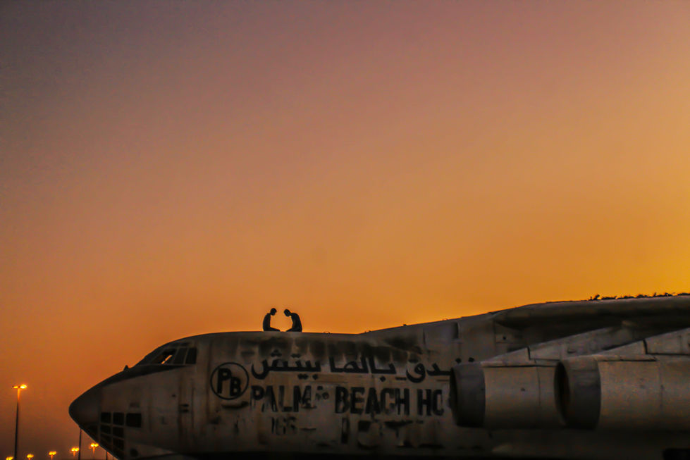 Desert Prayer at Sunset – 1970s Plane Wreck and Human Presence