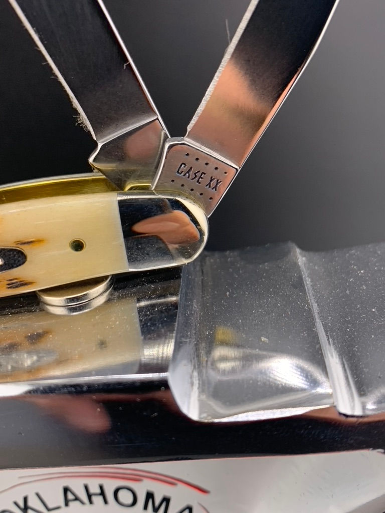 Thumbnail: Case Amber Bone Peach Seed Jig Meduin Stockman