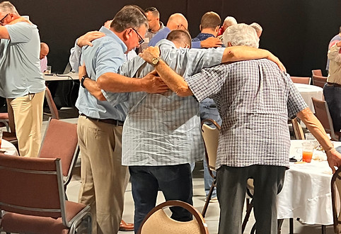 Pastor dinner Men Praying.JPEG