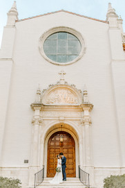 married couple in front of chapel doors