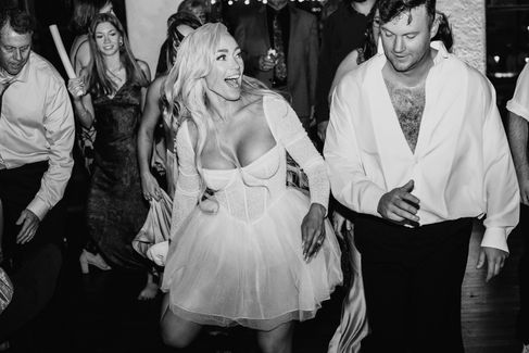 bride and groom dance on dance floor