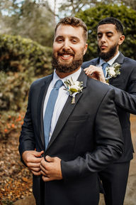 groom with chambray blue tie