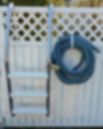 Thumbnail: Keeps vacuum hoses neatly coiled for pool areas.