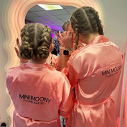 Teen girls getting makeup done at a teen party in Portsmouth, with a fun and glamorous atmosphere at Mini Moony's pamper party.