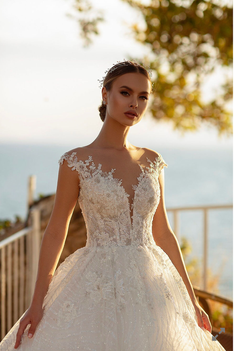 he plunging neckline and square back cut add a touch of sultry sophistication