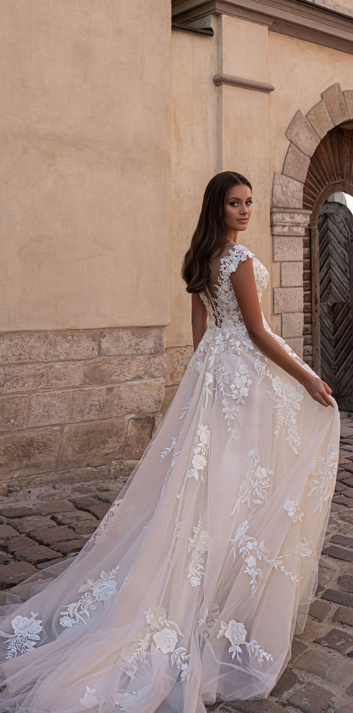 Bride in a romantic fitted wedding dress