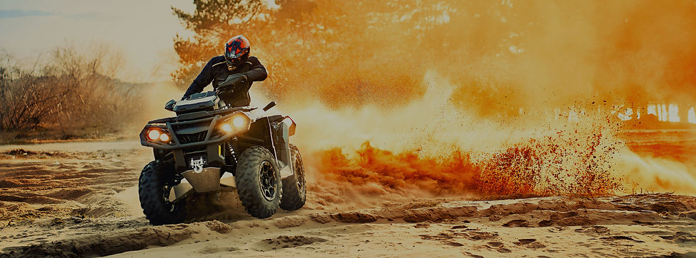 Four-wheeler/ATV off-roading on a dirt trail