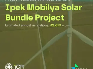 Visual announcement of İpek Mobilya Solar Bundle Project showing renewable energy production area symbolized by wind turbines. Annual estimated carbon reduction of 32,610 tons of CO₂-equivalent highlighted. Project complies with International Carbon Registry (ICR) and ICROA standards.