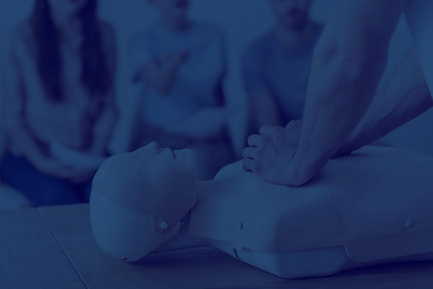 cropped-view-instructor-performing-chest-compression-dummy-during-cpr-training-class_edite