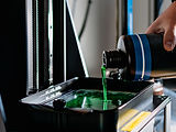 3d printer and its resin tank for filling and printing.jpg