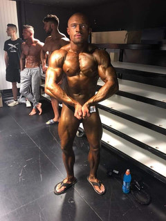 phillip_most_mascular_after_show_backstage_schmidt_gym_lion.jpeg