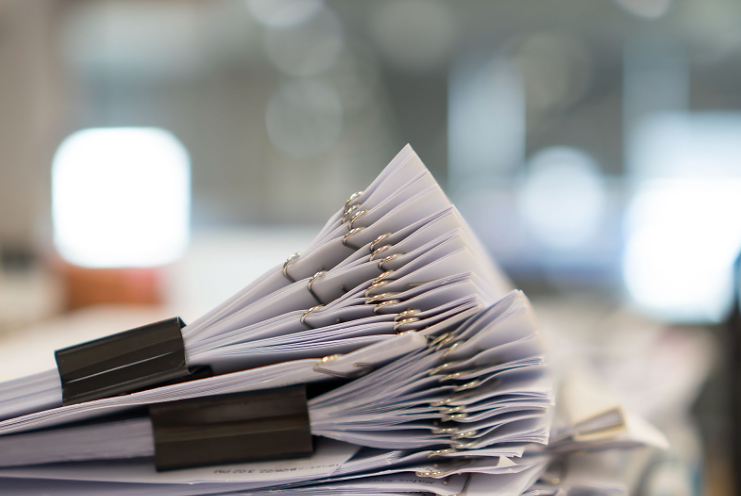 Children doing arts and crafts together at a long table