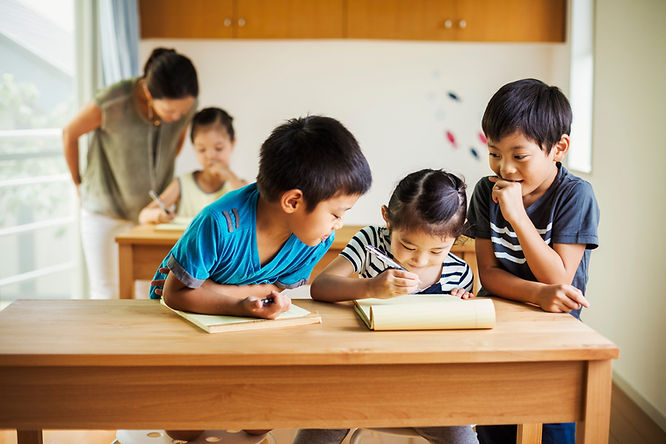 a group of pre schoolers learning with each other