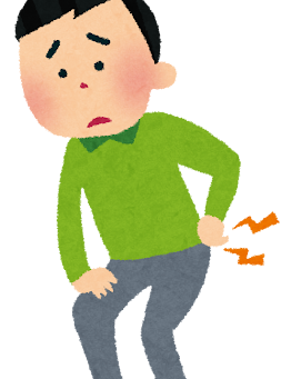 腰痛に悩む男性