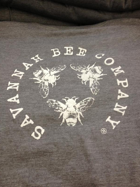 Water based ink and discharge ink make very soft prints like this Savannah Bee Company shirt.