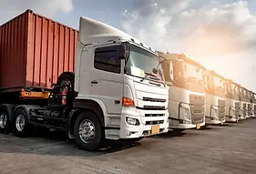 trucks-parked-lined-up_36860-705 (1).webp