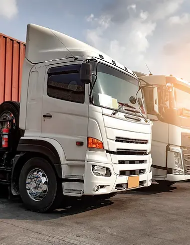 trucks-parked-lined-up_36860-705 (1).webp