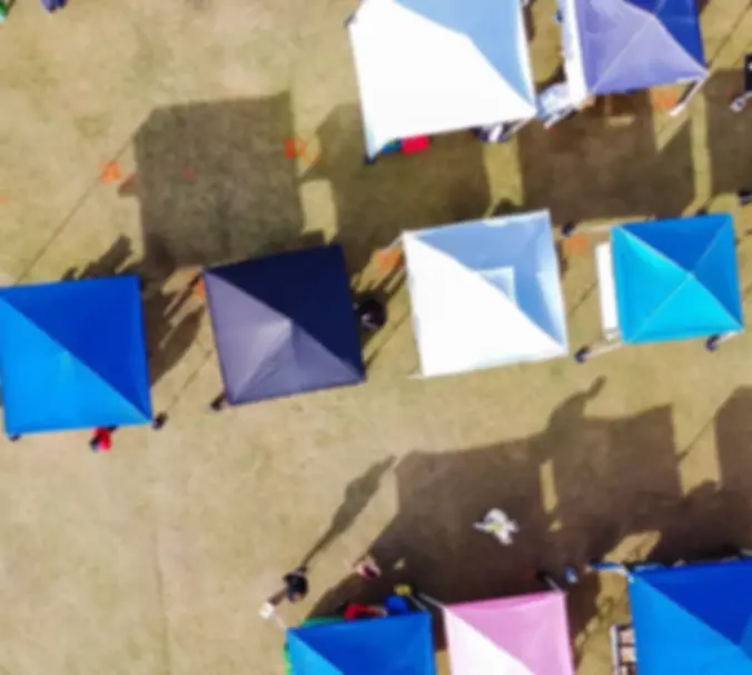 vendor-booth-tents-outdoors-ariel-view-HERO-10-29-2024-1024x607.webp_strip=all&lossy=1&ssl