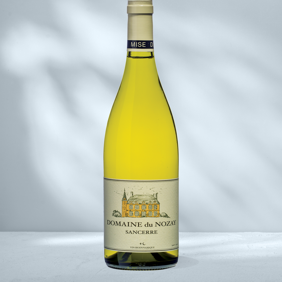 Bottle of Domaine du Nozay with white label showing Nozay branding and Sancerre designation