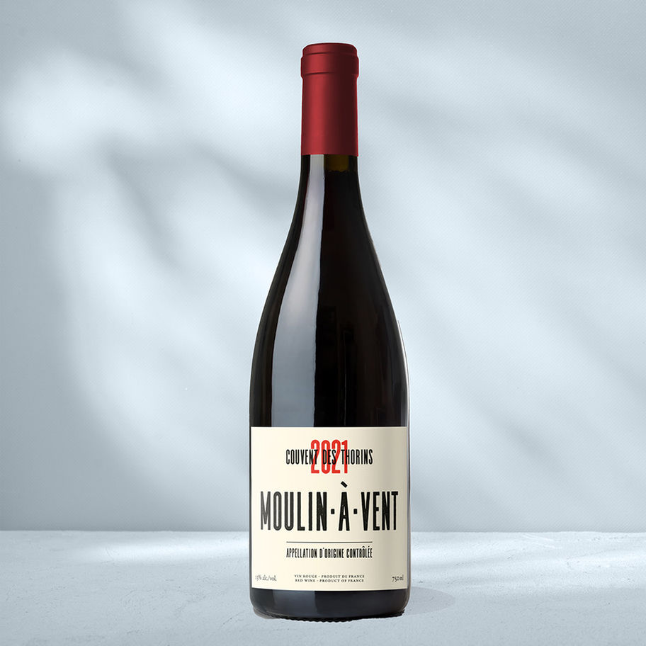 Chateau Moulin A Vent 2021 Coubent Des Tourins with white label showing AOC and 2021 vintage