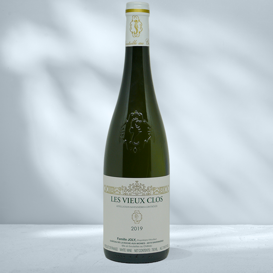 Bottle of Famille Joly Les Vieux Clos with white label showing Savennieres designation
