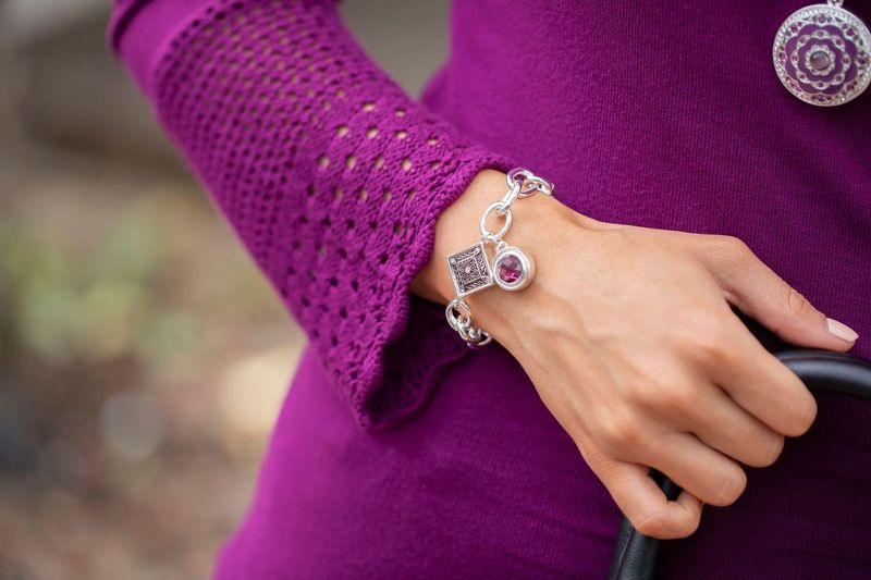 A close-up of a woman wearing a bracelet
