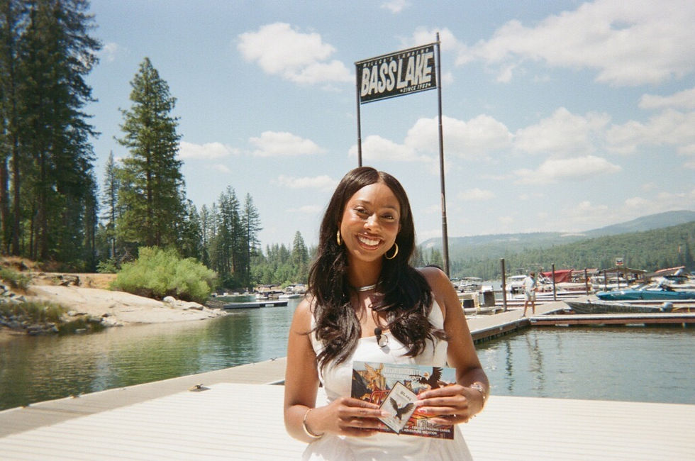 Kayla Holt in front of Bass Lake