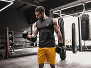 man-lifting-weights-while-wearing-custom