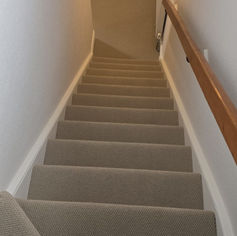Clean carpeted stairs after commercial cleaning service.