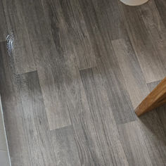 Clean wood-look tile bathroom floor