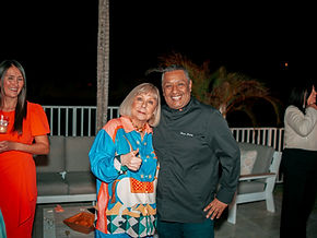 Marco Bernuy with TV personality Cristina Saralegui at an exclusive celebrity catering event