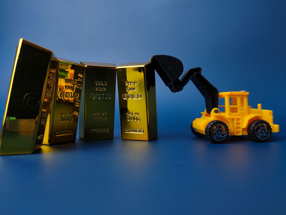 Gold bars and excavator