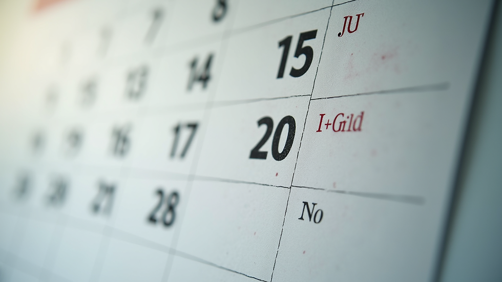 Close-up view of a calendar with a three-month period highlighted