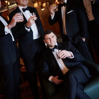groom and groomsmen cheers