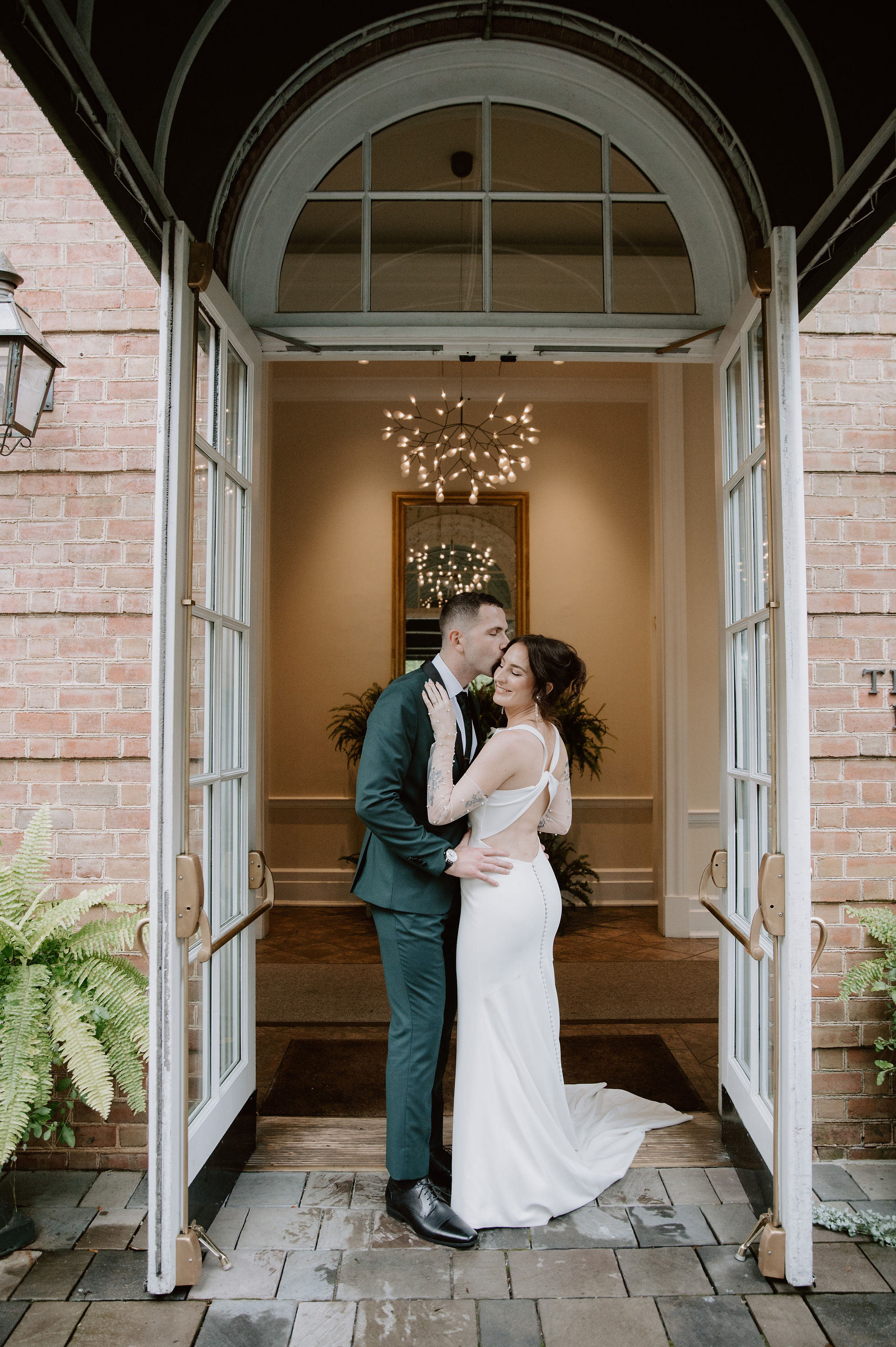 bride and groom smiling after their first look