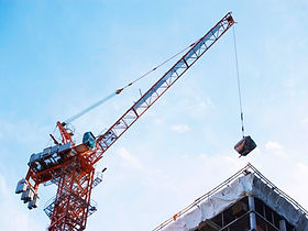 Crane lifting on construction site