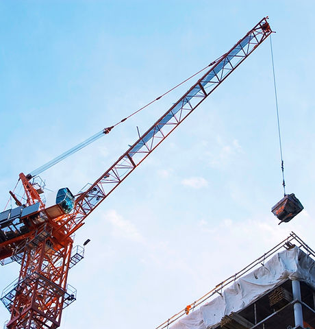 Crane lifting on construction site