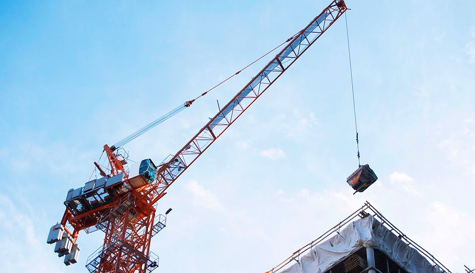 Crane lifting on construction site