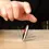 Thumbnail: Fidget spinner being spun on a desk