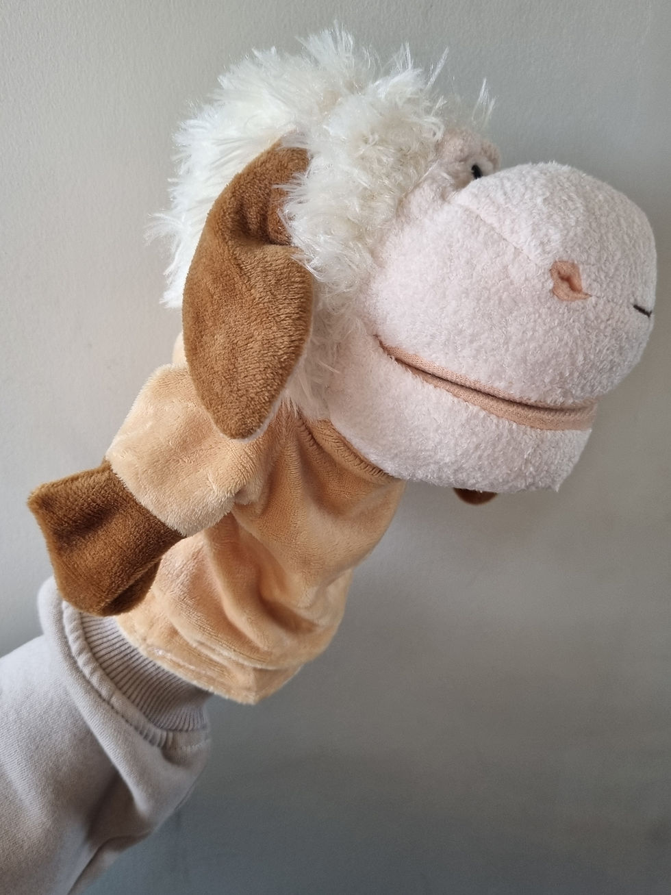 Thumbnail: side view of lamb hand puppet