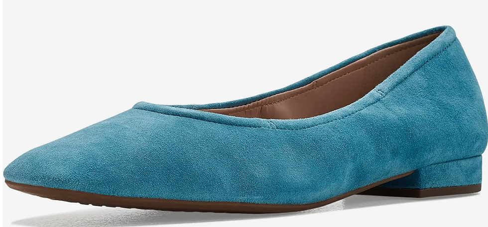 Teal suede flat shoe on a white background, shown in side view with a low heel and brown sole.