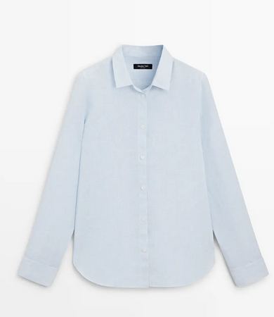 Light blue long-sleeve button-up shirt laid flat on a white background, clean and minimal.
