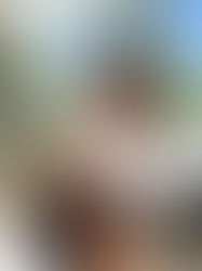 Professional work capsule look featuring a crisp white button-down shirt with rolled-up sleeves, a black leather pencil skirt, a dark brown structured leather tote, and gold jewelry – 6 Spring Essentials 2026.