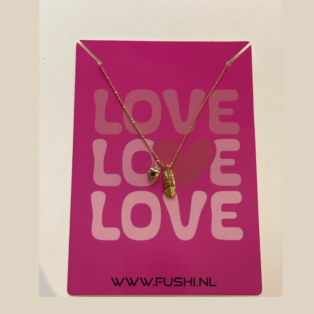 Ketting FUSHI Amsterdam met veertje en hartje met rood steentje