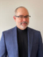 A man posing for a portrait. 